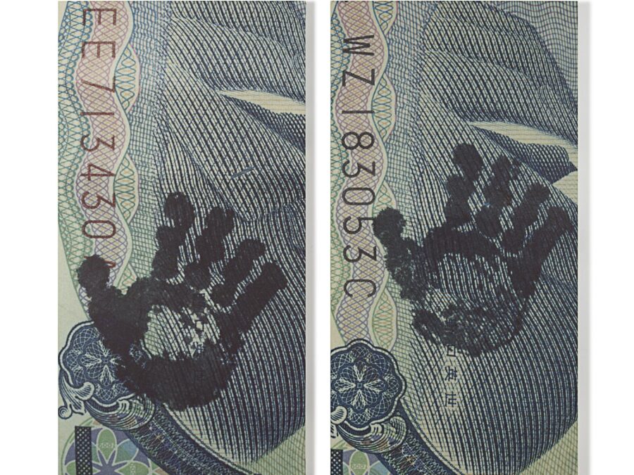 Two nearly identical images of a closeup of a USD bill's routing numbers and a handprint, but the hand print is in different places and the routing numbers of different