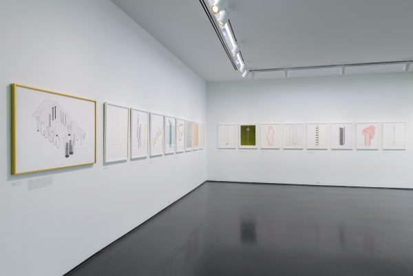 Gallery view of a tightly hung row of illustrations all of equal size
