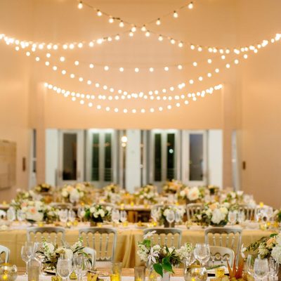 String lights hang over tables in the MCA's atrium