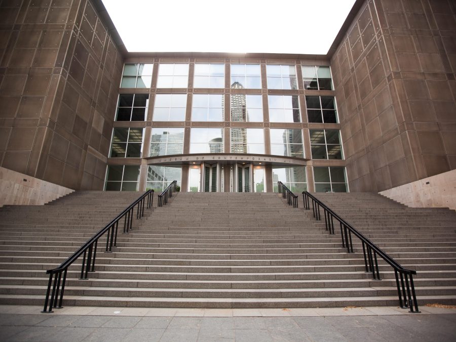 Looking up from the base of the stairs leading to the main entrance of the MCA