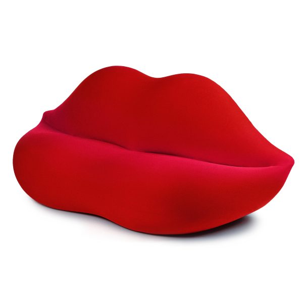 This is a sofa in the shape of lush red lips.