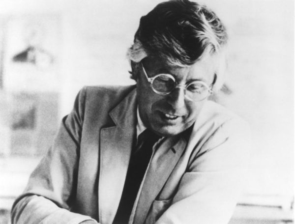 Photograph of Josef Paul Kleihues in light suit and round glasses