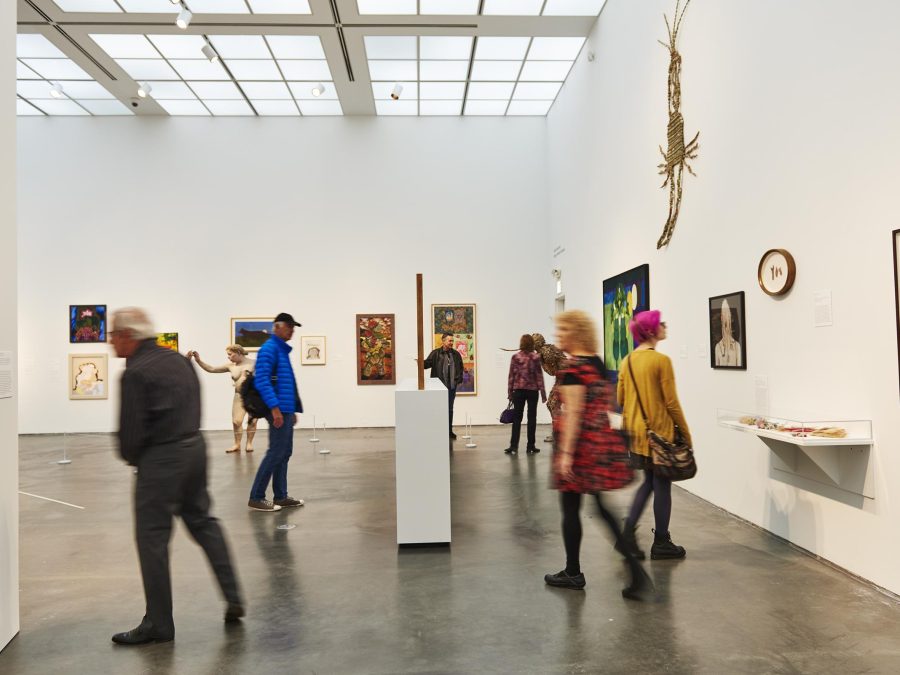 Visitors take in art in a gallery on the MCA's second floor.