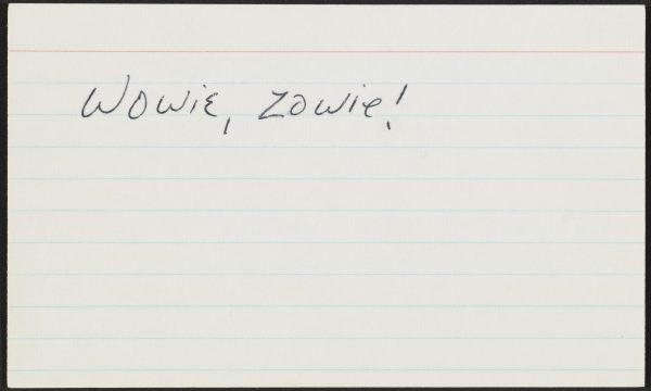 An index card with handwritten text reading wowie, zowie!