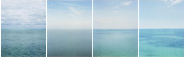 Four images of an open body of water reflecting different conditions and water colors