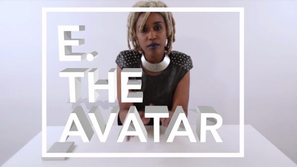 A female-presenting person with light brown skin and blond dreadlocks sits at a white table against a white backdrop. The text E the Avator appears in white shadow text within a white box over the image.