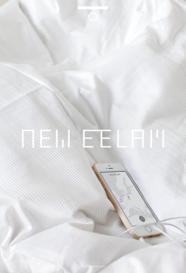 An iPhone displaying an unmarked map of Europe rests on crisp white bedding. Futuristic white text reading 