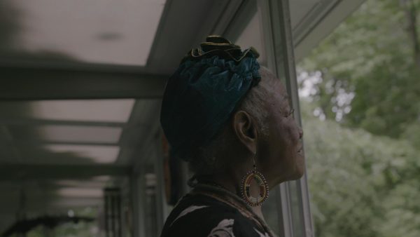 A person stares out the window