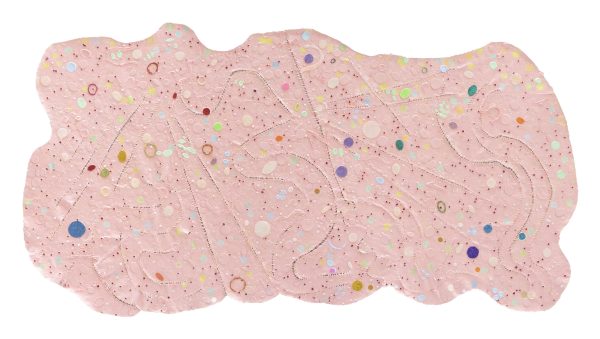 An organically shaped pink canvas is decorated with circles of varying sizes and fanciful colors like neon green, lilac, and goldenrod.
