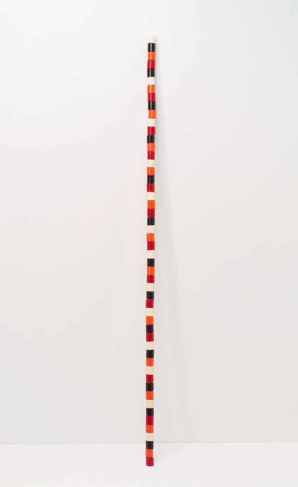 A thin line made up of various sized cubes resembling building blocks in different colors