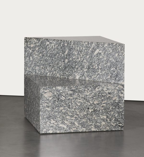 A cube that has been cut away to create a bench