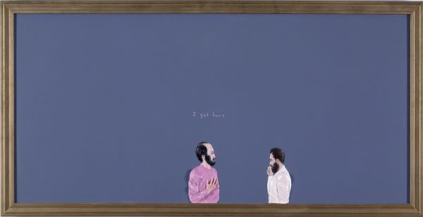 Framed painting of two people at the bottom of a large block of purple. Above the person on the left is handwritten text reading I get hurt.