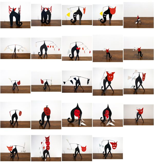 A mobile of a cat with a red head and black bock pictured in various poses in a 5 by 5 grid of 24 photos.
