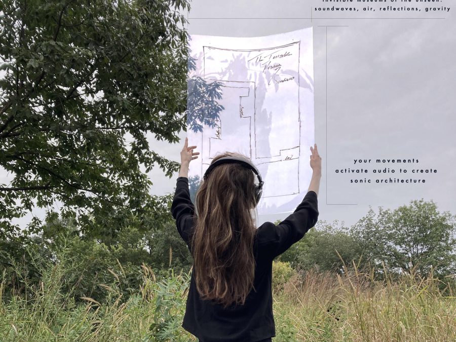 A person wearing headphones holds up a map to the sky in an outdoor setting. Text appears to the upper and bottom right of the map