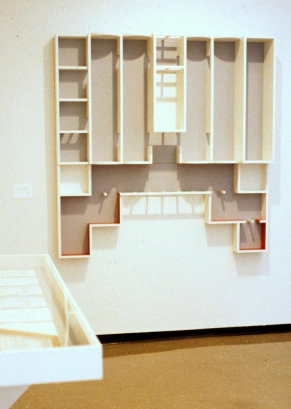 a scaled model of the MCA's floorplan attached vertically to a wall