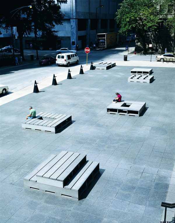 Reprocessed plastic and stainless steel bolts form benches and tables in the MCA plaza