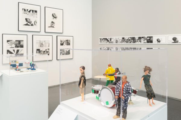 Exhibition interior with toy figurine band in the foreground