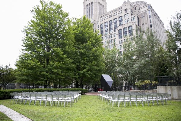 chairs arranged neatly in sculpture garder