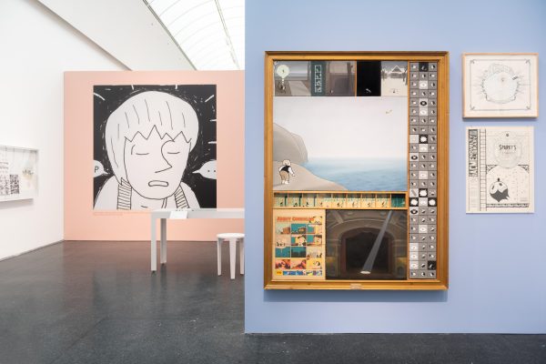 Several artworks hang on walls at varying distances from the camera.